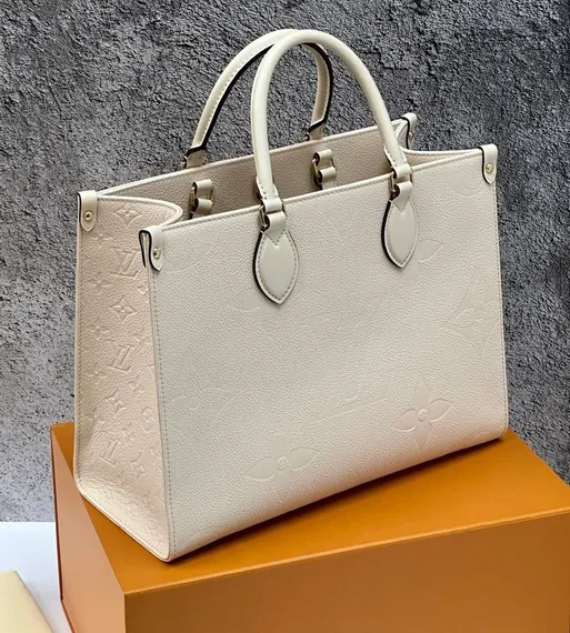 Сумка Louis Vuitton Onthego кремовый