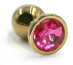 Золотистая алюминиевая анальная пробка с ярко-розовым кристаллом - 7 см. (Цвет: розовый)
