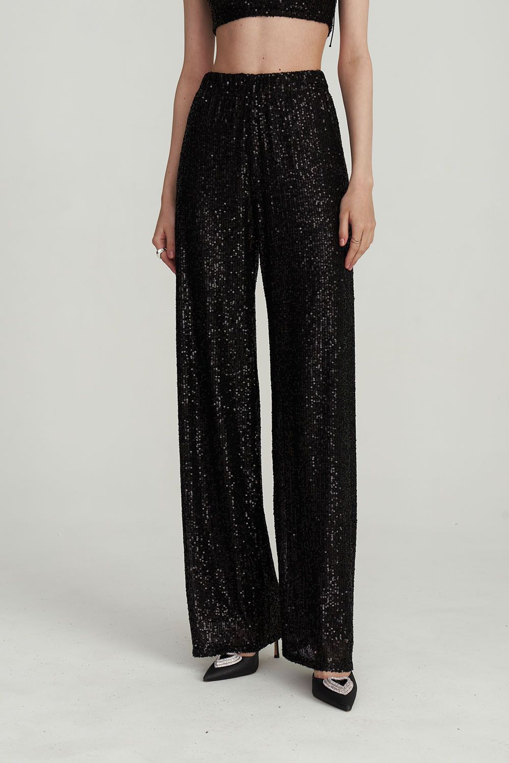 Брюки с пайетками черного цвета