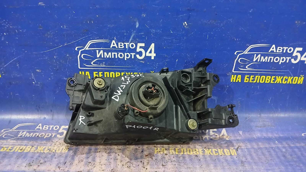 Фара передняя правая MAZDA DEMIO 1999-2002