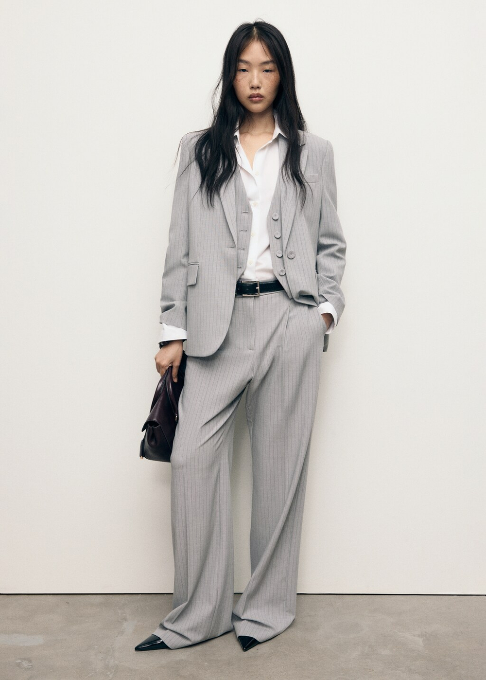 Костюмные брюки в узкую полоску