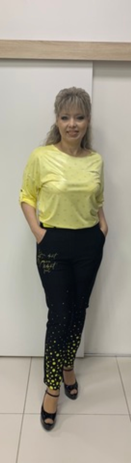 Черные с желтыми горошинами и надписью брюки-штанишки