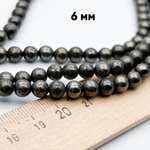 Пирит бусины, диаметр около 5,9-6,1 мм, цена за 31-32 шт (1/2 нити)