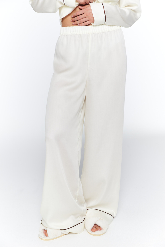 Брюки из тенселя с кантом айвори