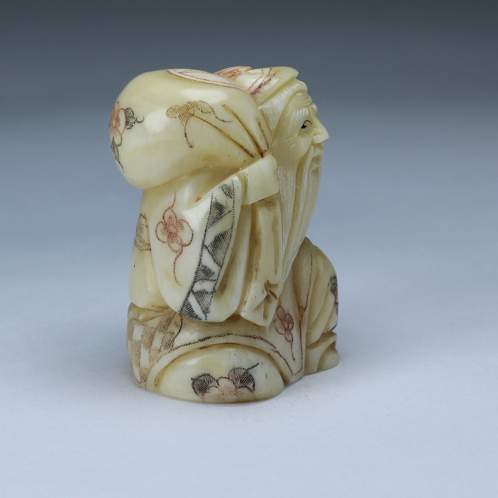 Нэцкэ Фукурокудзю с тыквой горлянкой и корзиной рыбы