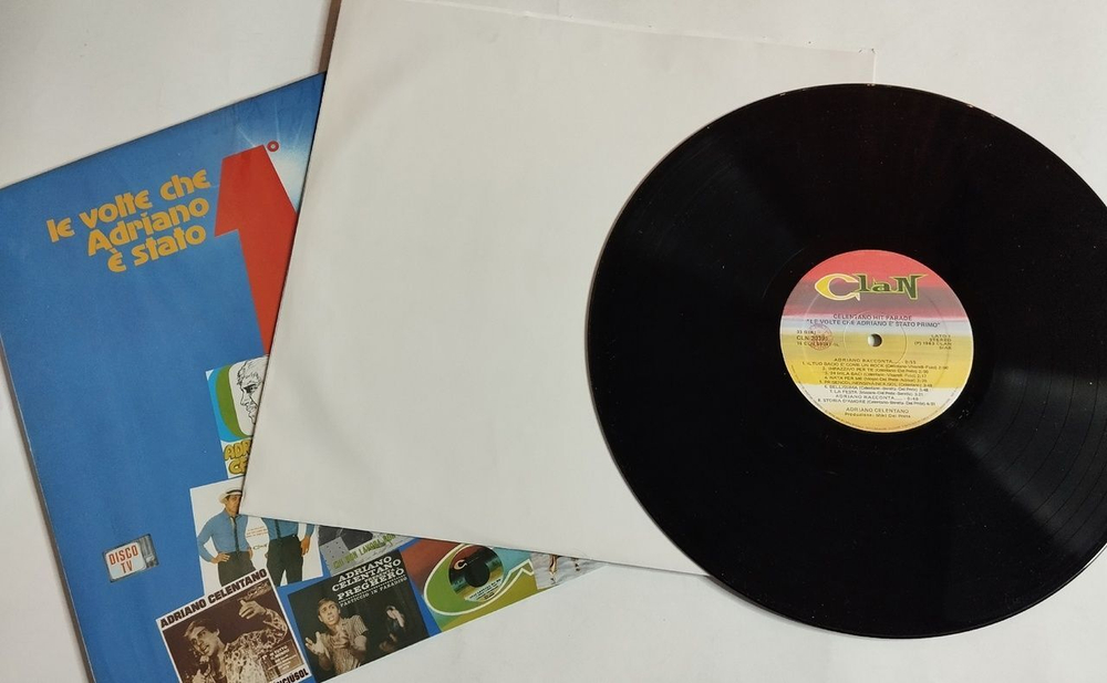 Винтажная виниловая пластинка LP Adriano Celentano Hit Parade Le Volte Che Adriano E Stato Primo (Italy 1983)