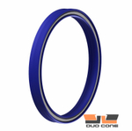 Поршневое ассиметричное уплотнение одностороннего действия с кромками, поддерживаемыми спиральной пружиной.