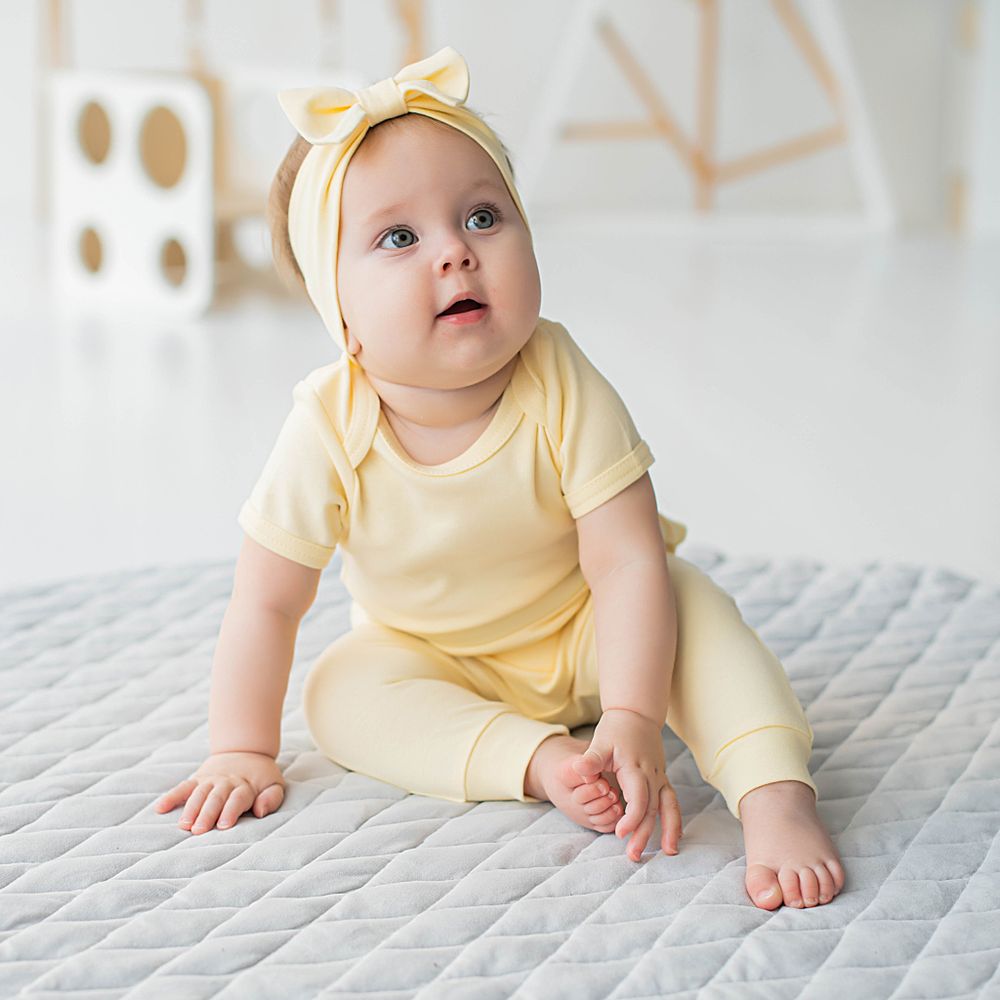 Ползунки с открытой ножкой и рюшей "Нарцисс" 0+