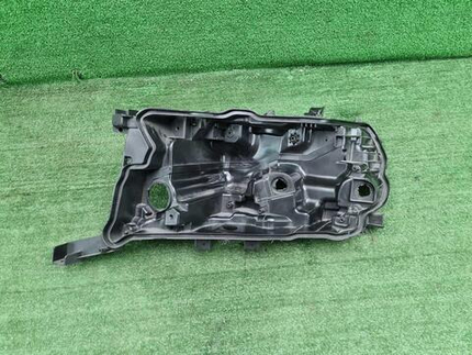 Корпус фары левый Toyota Land Cruiser 200 (15-21)
