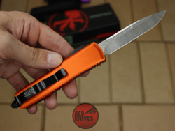 Нож Microtech UTX-85 S/E - оранжевая рукоять, стандартный клинок, сатин + запчасти RK-393