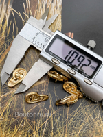 Пуговицы Скиапар. золотистые "Ухо"