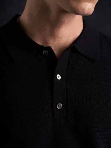 Черная трикотажная футболка-поло Laine New