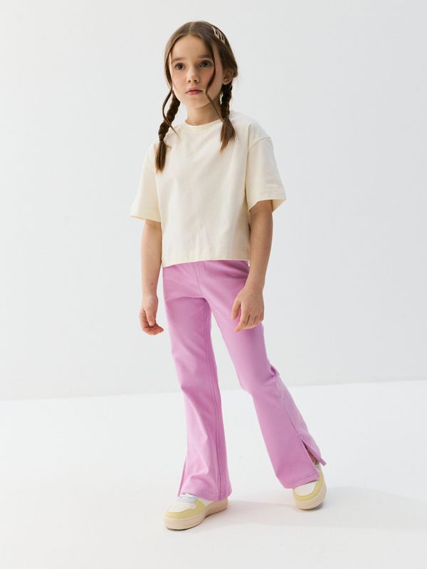 Брюки клеш с разрезами 