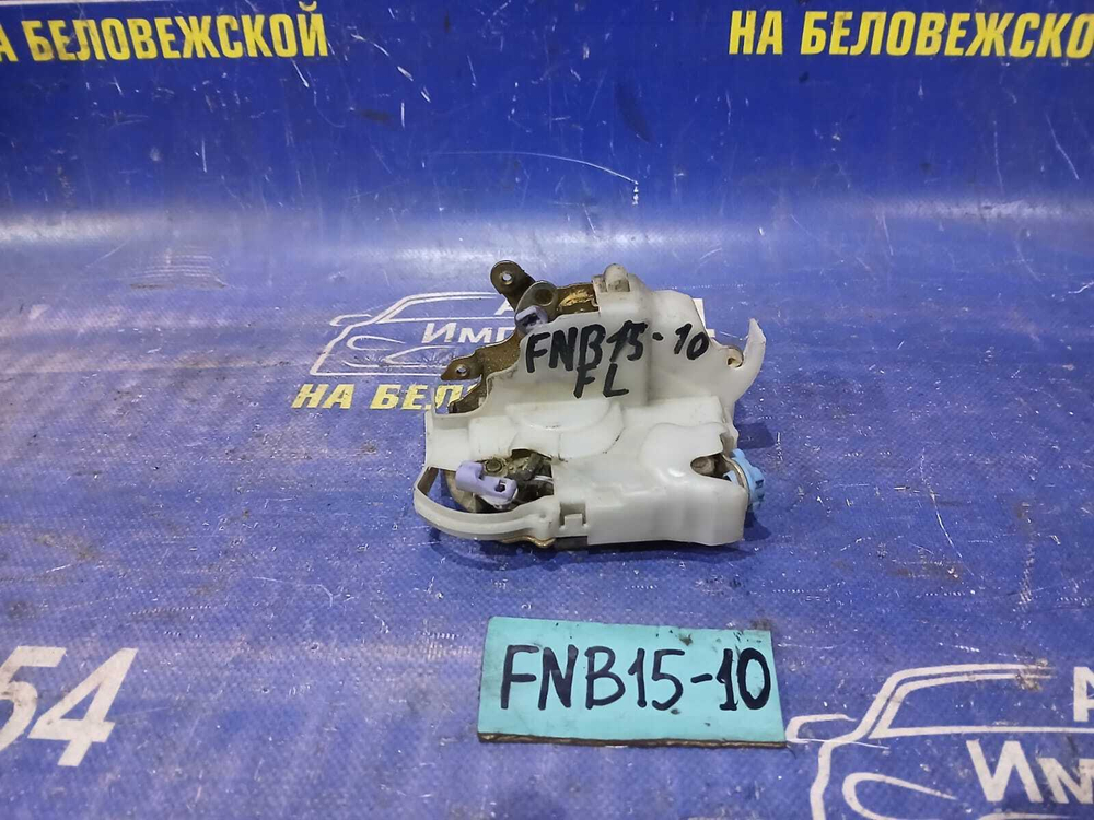 Замок двери передней левой NISSAN SUNNY 2000