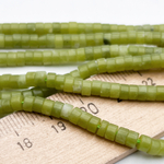 Серпентин бусины, рондель, размер около 4*2,4 мм, цена за отрезок 19 см (1/2 нити)