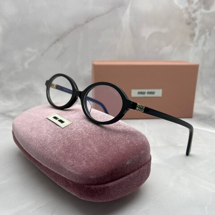 Солнцезащитные очки MIU MIU