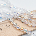 Бусина стекло, цвет прозрачный АВ, размер 4,8*4 мм, цена за отрезок 19 см (1/2 нити)