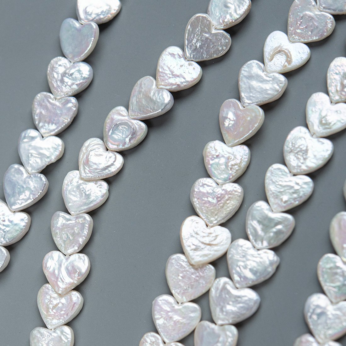 Жемчуг культивированный  в форме сердца, 10мм, белый