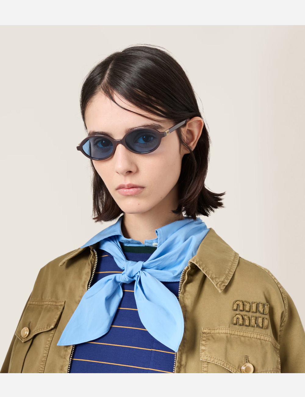 Солнцезащитные очки Miu Miu Regard Indigo lenses