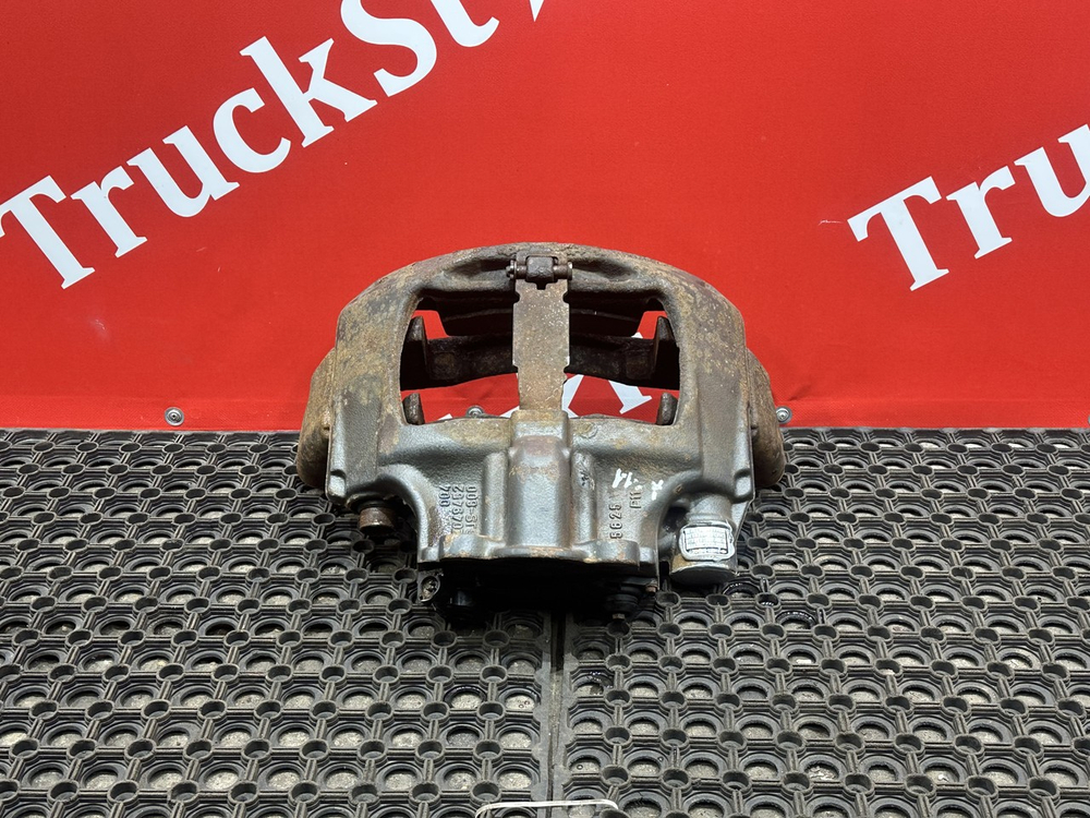 Суппорт задний левый