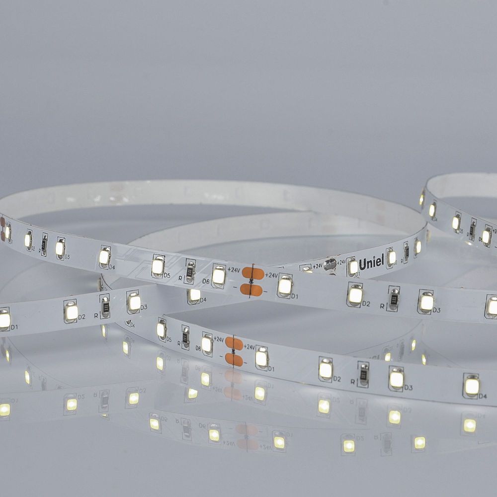 ULS-2835-60LED-m-8mm-IP20-DC24V-6W-m-5M-DW Гибкая светодиодная лента на самоклеящейся основе. Катушка 5 м. в герметичной упаковке. Дневной белый свет 6500K. ТМ Uniel.