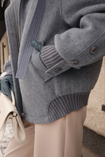 Пуховик средней длины из шерсти с капюшоном