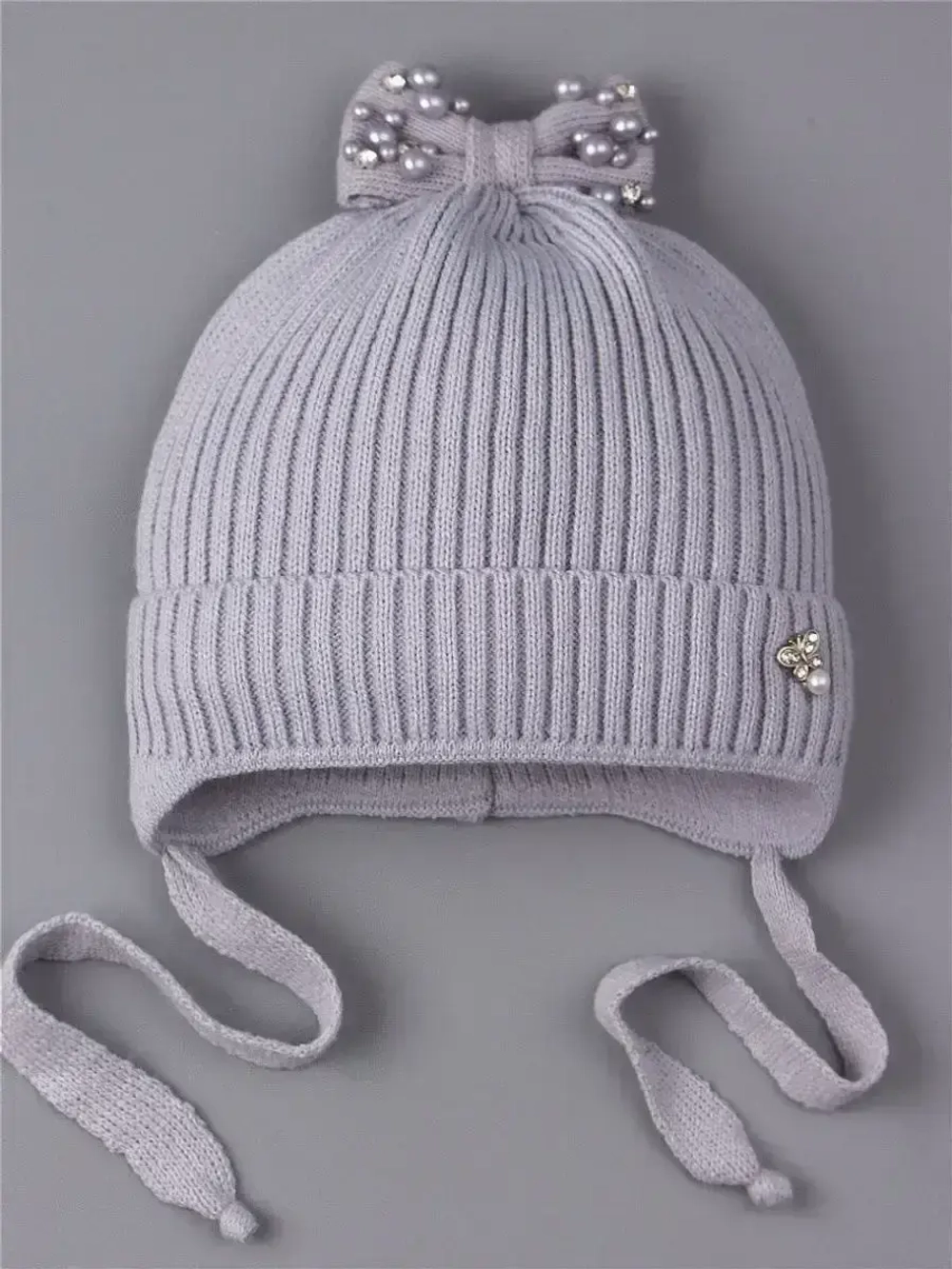 Шапка вязаная демисезонная на завязках