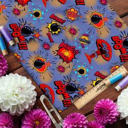 Ткань атлас звуки взрывов из комиксов на синем фоне