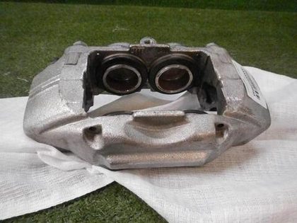 Суппорт тормозной левый Cadillac Escalade 5 20-нв