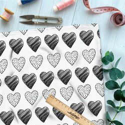 Ткань блэкаут чёрные сердечки на белом фоне