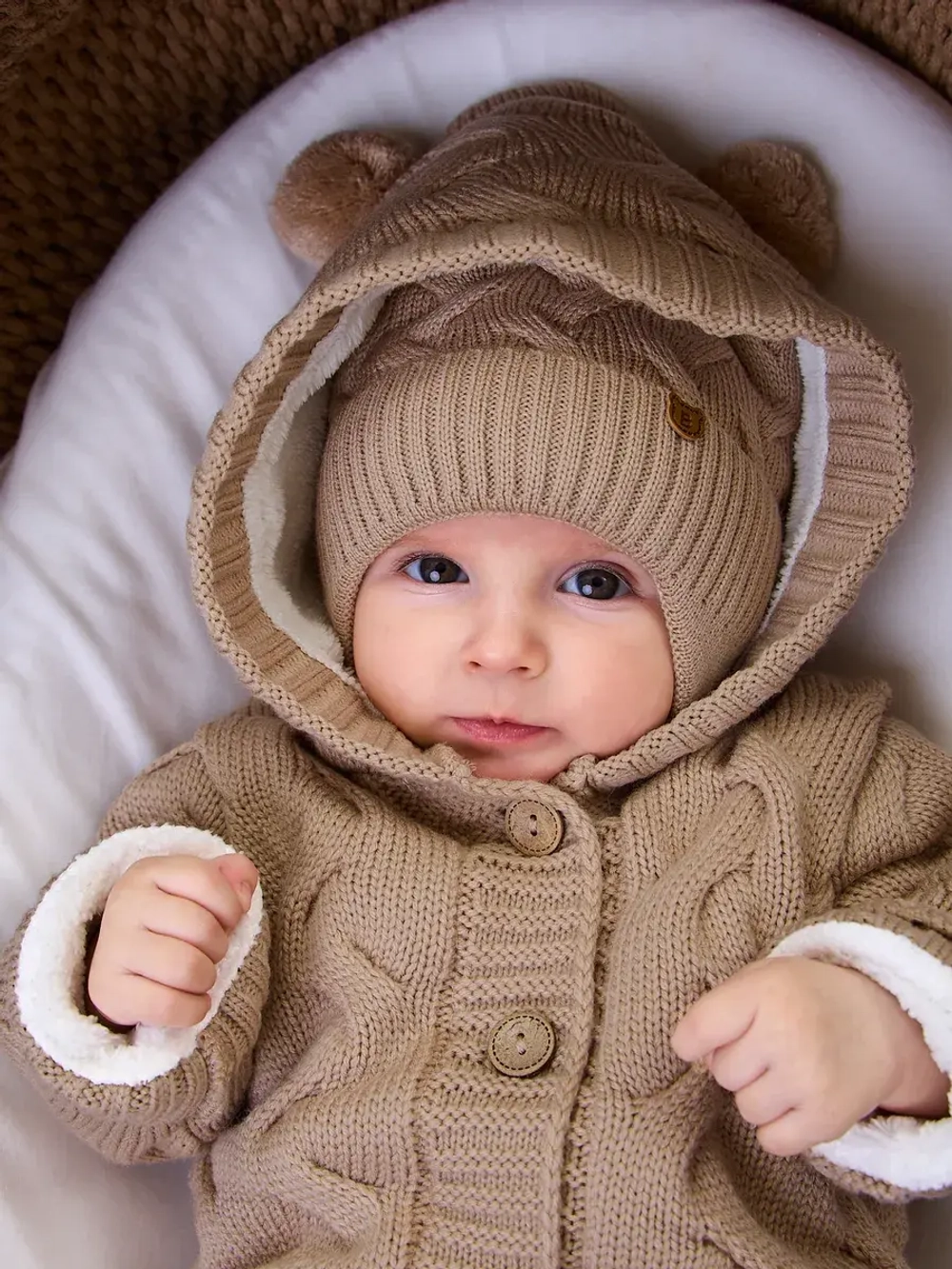 Вязаный комбинезон для новорожденных