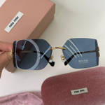 Солнцезащитные очки MIU MIU
