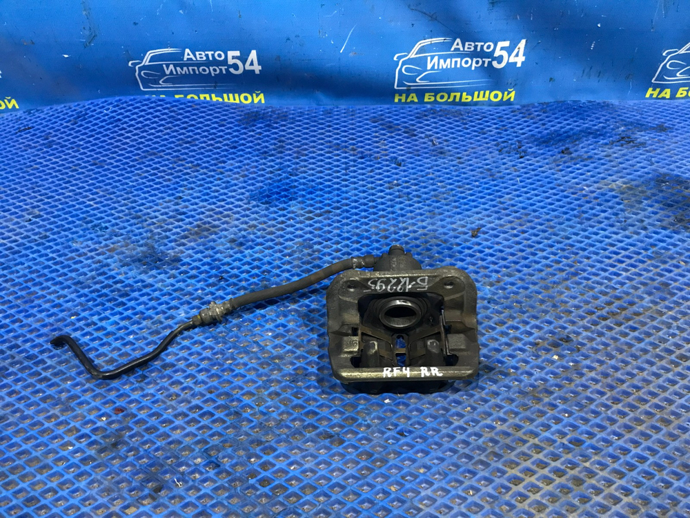 Суппорт тормозной задний правый Honda STEPWGN 2001-2005