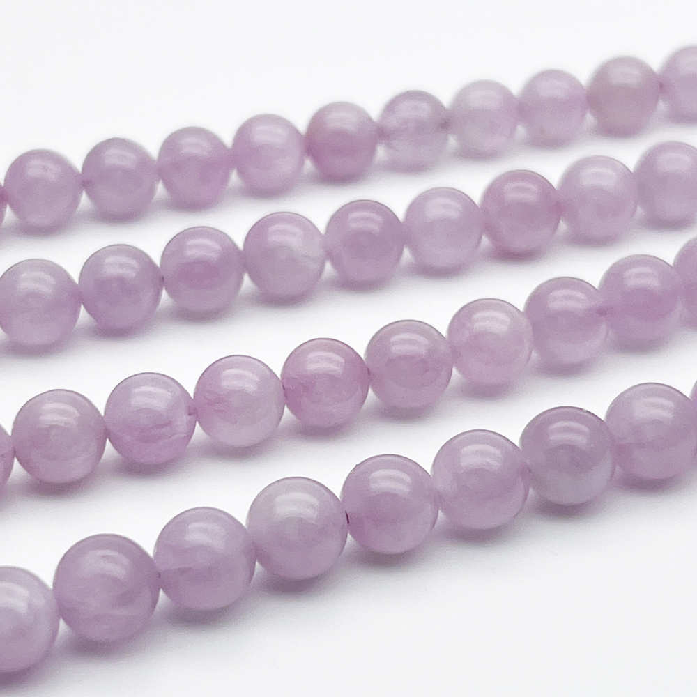 Кунцит бусины, диаметр около 6,6-6,8 мм, цена за 14-15 шт (1/4 нити)