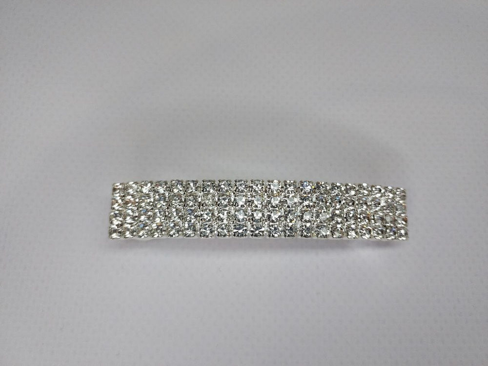 Французская весенняя заколка автомат для волос. Со стразами в четыре ряда. Цвет серебро.