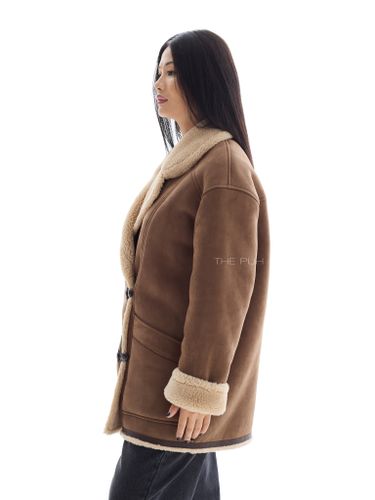 Коричневая дубленка с петлевыми застёжками