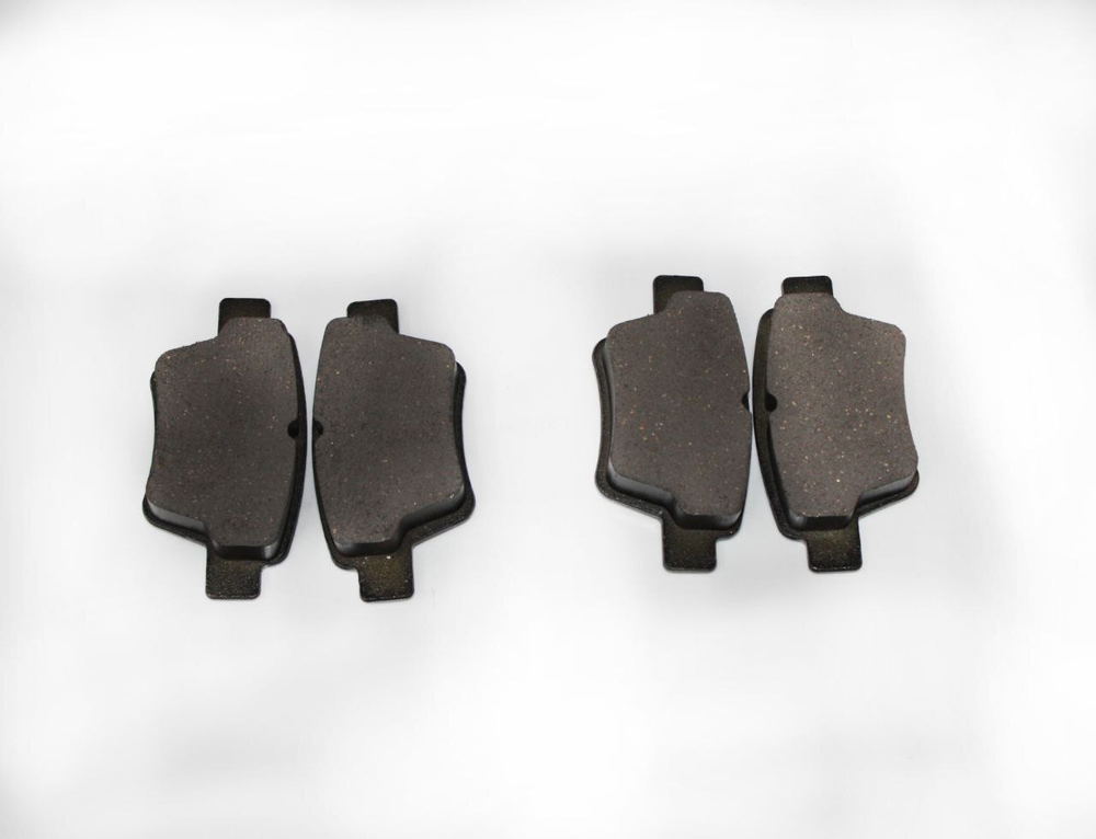 Колодки тормозные задние 1064001725 Geely Emgrand EC7