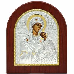 Страстная икона Божией Матери в серебряном окладе.