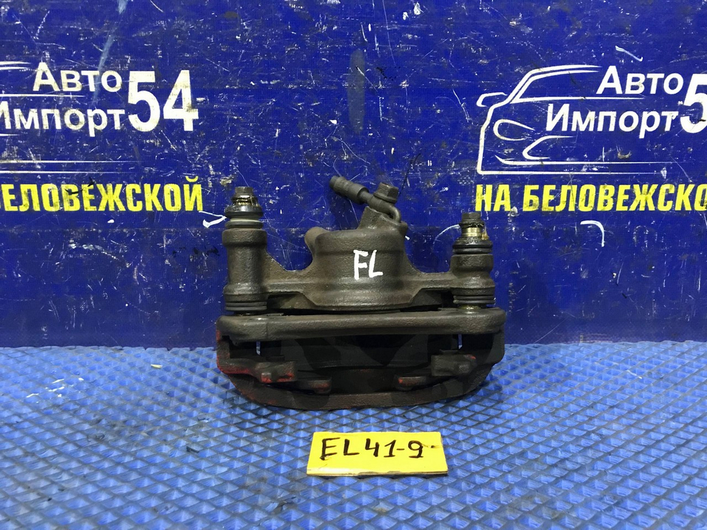 Суппорт тормозной передний левый TOYOTA CORSA 1991