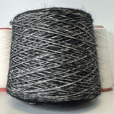 COCKER - Pecci Filati; 22% альпака superfine, 14% меринос 64% хлопок organic; 200м/100гр. col.999 цвет: черный пух на белом шнурке