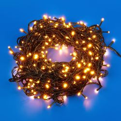 ULD-S5000-500-DGA WARM WHITE IP20 Гирлянда светодиодная. 50м. 500 светодиодов. Теплый белый свет. Провод зеленый. ТМ Uniel