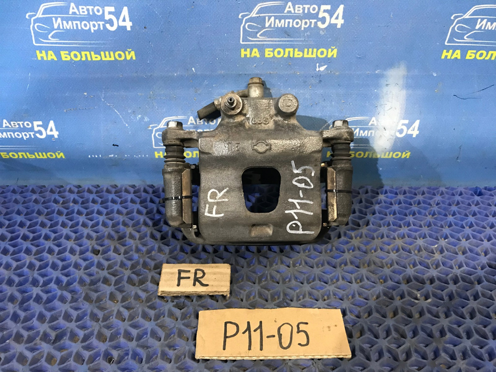 Суппорт тормозной передний правый NISSAN PRIMERA 1999