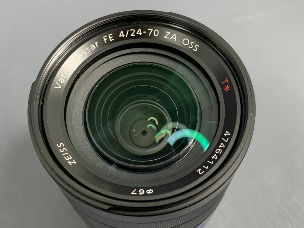 Sony 24-70mm SEL-2470Z Царапины на линзе