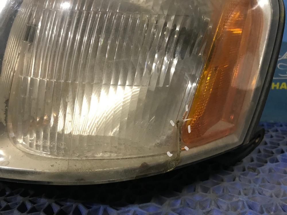 Фара передняя левая MAZDA TRIBUTE 2000