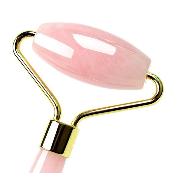 Массажер роликовый из розового кварца 14 см