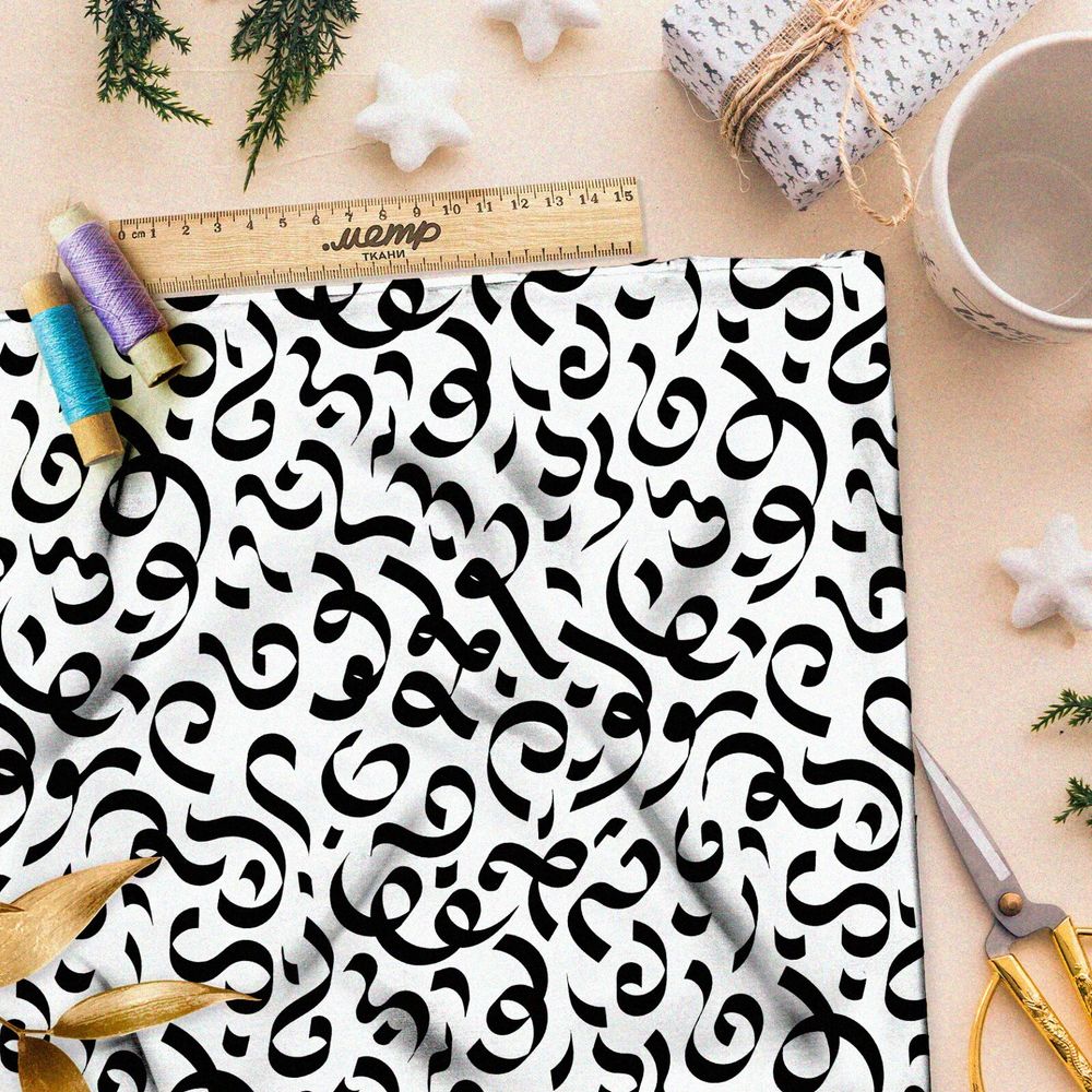 Ткань ниагара крупные каллиграфические узоры на бежевом фоне