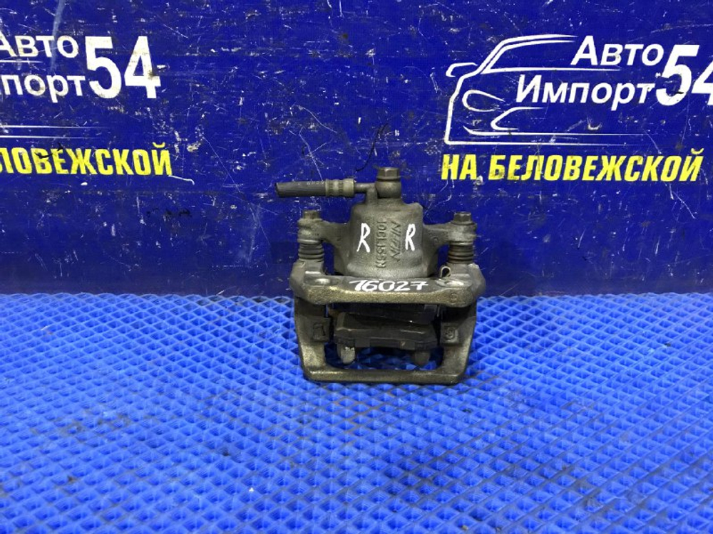 Суппорт тормозной задний правый Honda STEPWGN 1996-2001