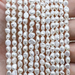 Жемчуг 2А речной бусины 3-4 мм, на нитке 38 см