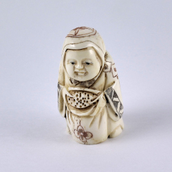 Нэцкэ Ребенок Карако с мешком риса