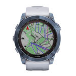 Спортивные часы Garmin fenix 7X Sapphire Solar Edition, 51 мм, силиконовый ремешок цвета «Уайтстоун» Безель из титана цвета «синий минерал» с DLC-покрытием, дисплей Solar со стеклом Power Sapphire. Ремешок с классической застёжкой — на запястье обхватом 1